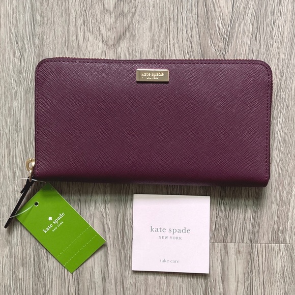 kate spade Handbags - Kate Spade Purple Saffiano Ziparound Wallet
